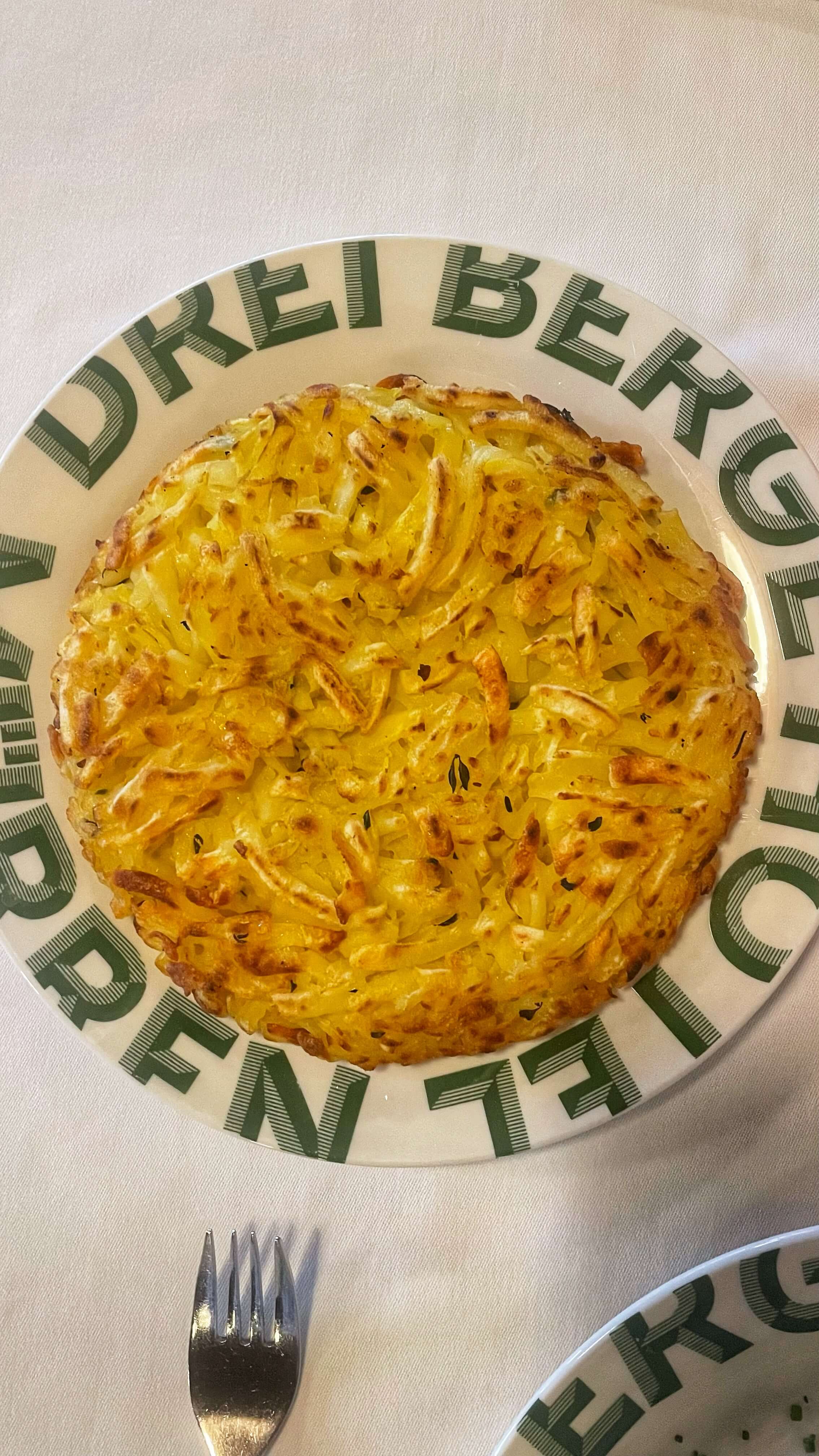 Crispy shredded potato packed together and shaped into a pancake.